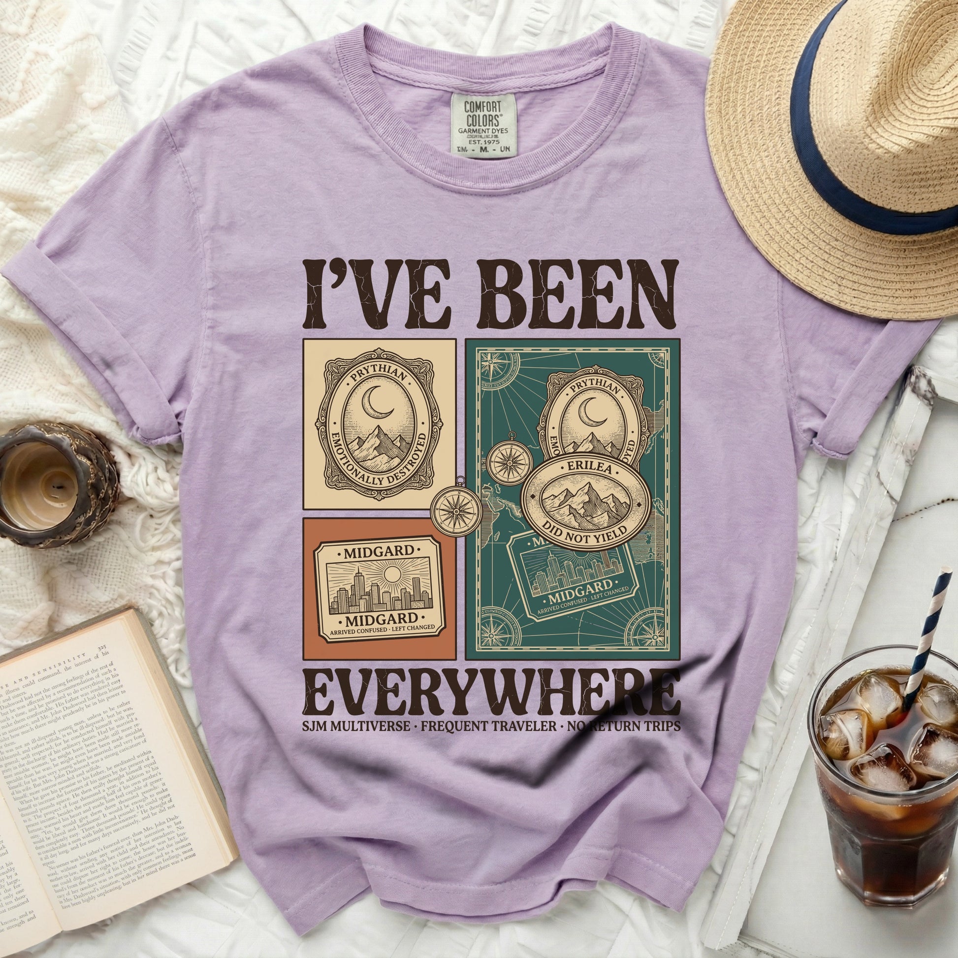 Purple t-shirt with "I'VE BEEN EVERYWHERE" graphic and travel-themed illustrations.