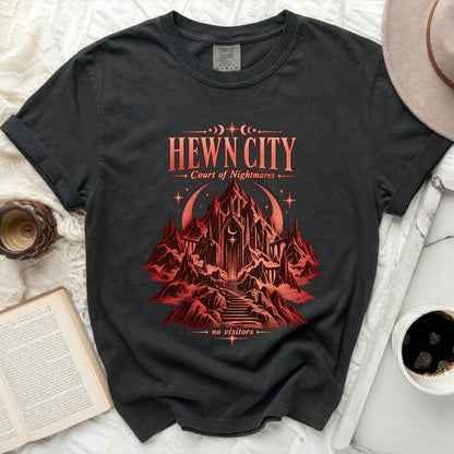 Dark t-shirt with "HEWN CITY Court of Nightmares" graphic and castle.