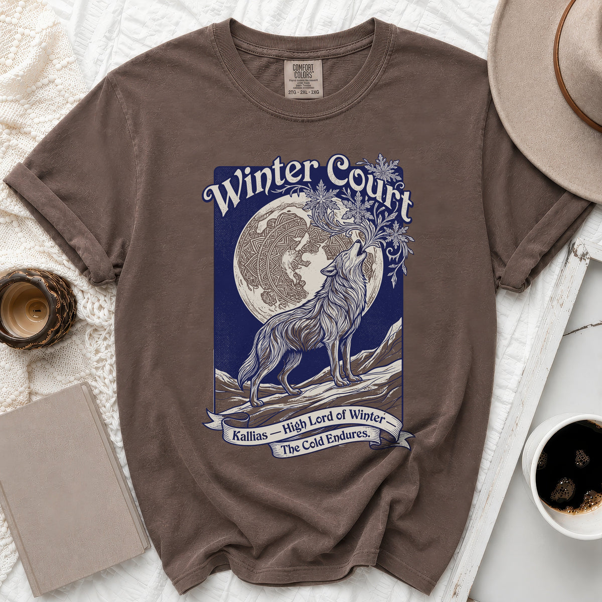Brown t-shirt with "Winter Court" and wolf howling at the moon graphic.