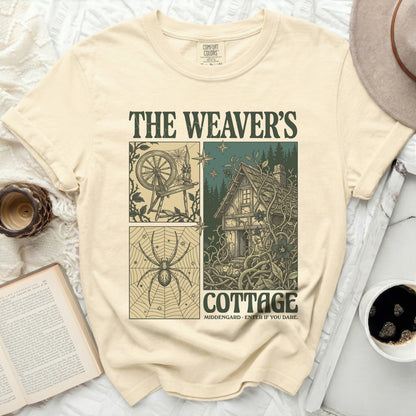 The Weaver's Cottage t-shirt features a four-panel design with a spinning wheel, spider, cottage, and text.