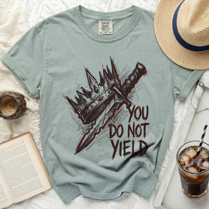 Gray t-shirt with a crown and sword graphic and text "YOU DO NOT YIELD".