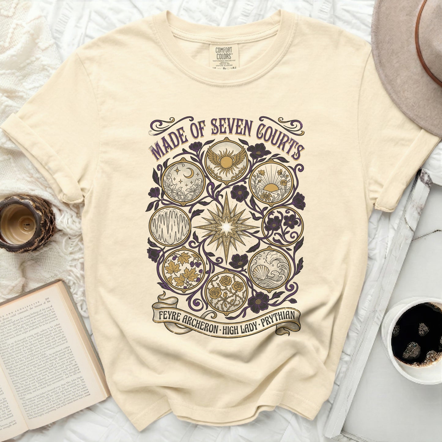 Cream t-shirt with purple and gold "Made of Seven Courts" design, "Feyre Archeron High Lady Prythian" text.