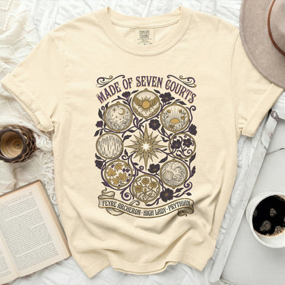 Cream t-shirt with purple and gold "Made of Seven Courts" design, "Feyre Archeron High Lady Prythian" text.