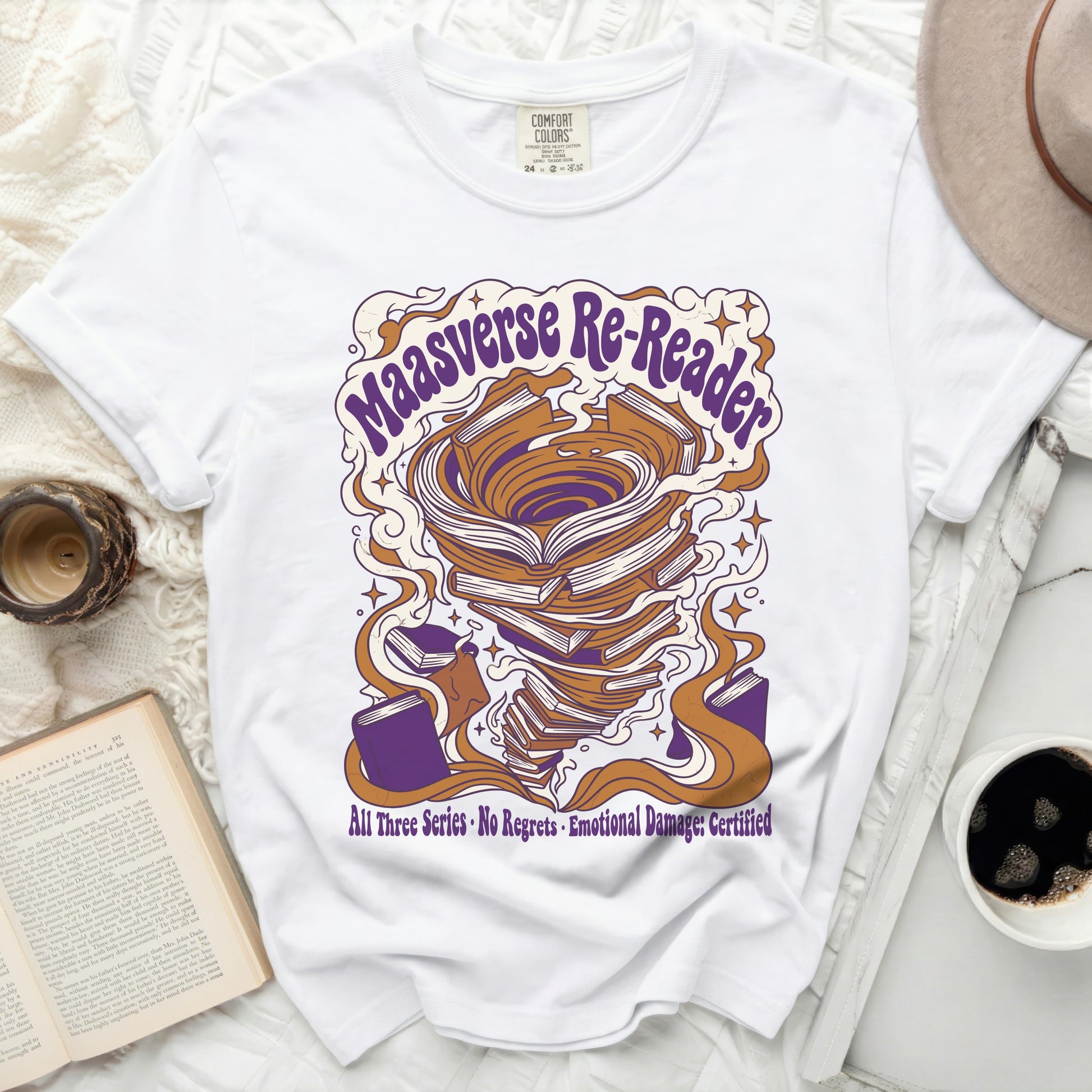 White t-shirt with "Maasverse Re-Reader" and swirling books graphic.