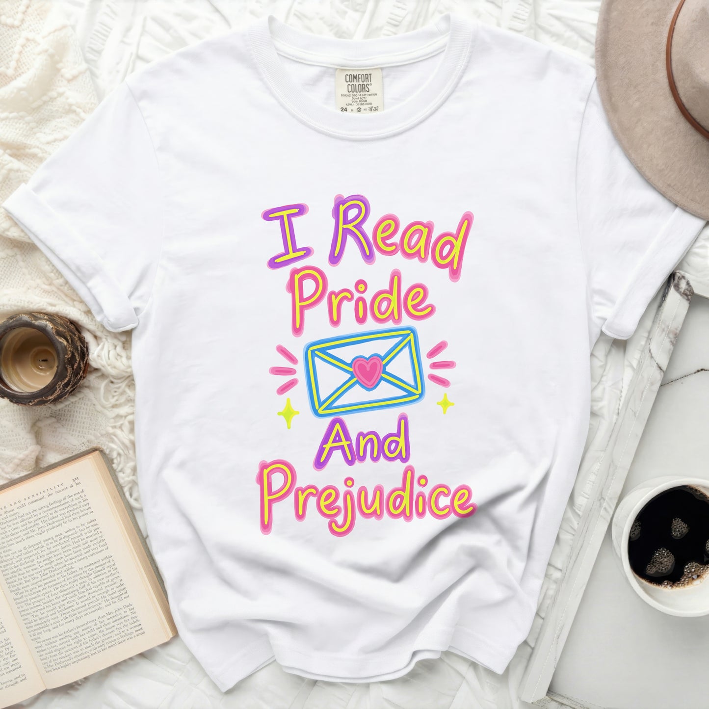 White t-shirt with "I Read Pride And Prejudice" text and graphic.