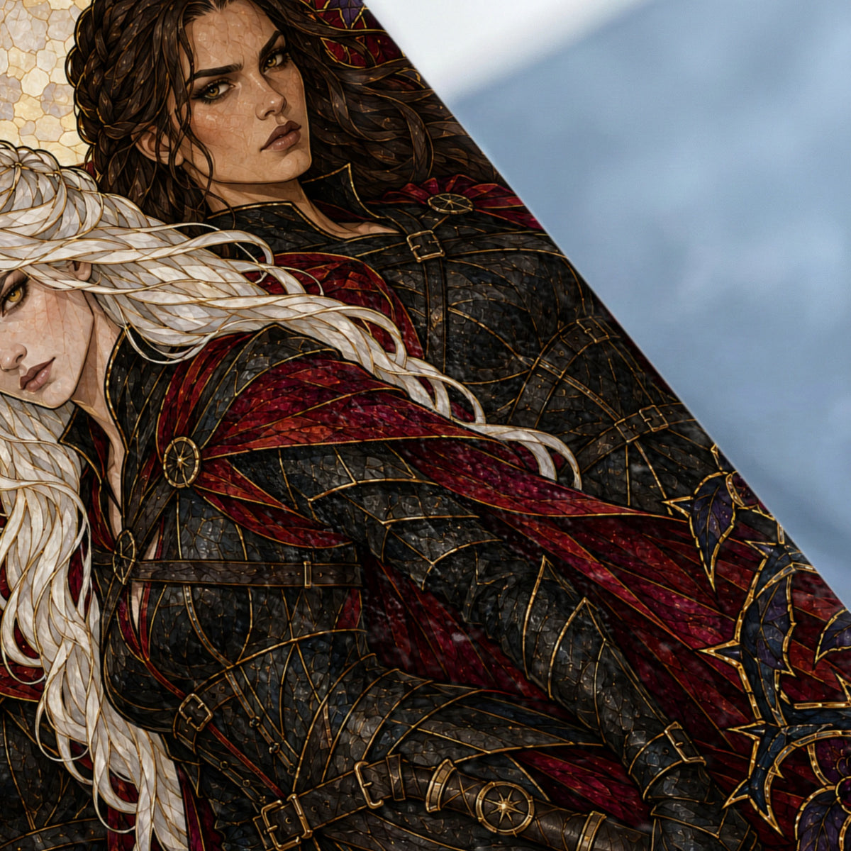 Two women with dark and white hair wear ornate black and red armor with gold trim.