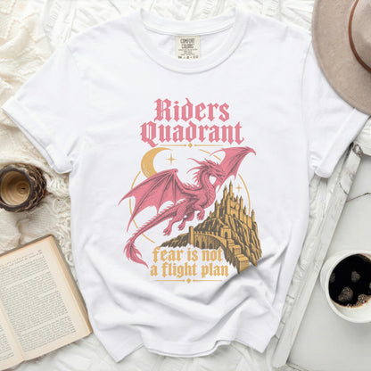 White t-shirt with pink dragon, castle, moon, and text "Riders Quadrant" and "fear is not a flight plan".