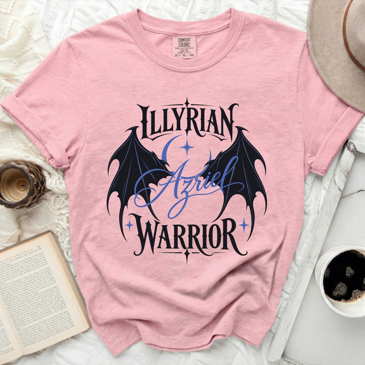 Pink shirt with "Illyrian Azriel Warrior" text and wings design.