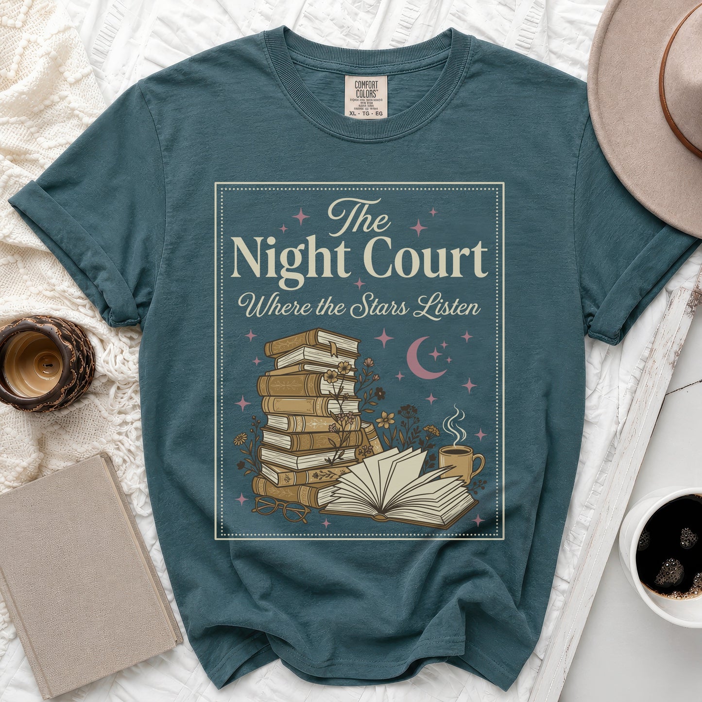 Teal t-shirt with "The Night Court Where the Stars Listen" text and book illustration.