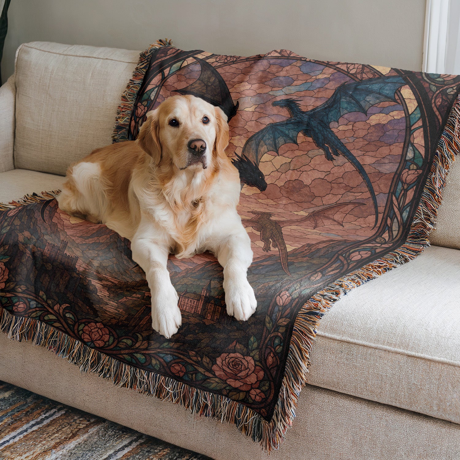 A golden retriever dog is lying on a colorful, patterned blanket on a couch.