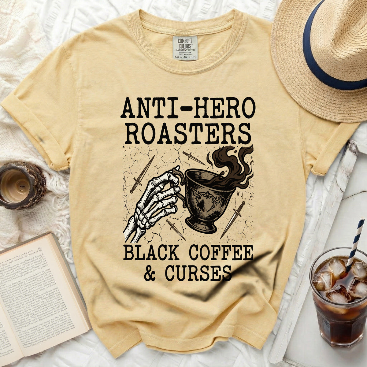 Yellow t-shirt with "Anti-Hero Roasters Black Coffee & Curses" graphic.