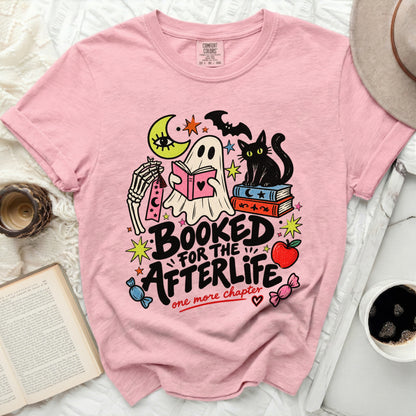 Pink t-shirt with ghost, cat, moon, and "Booked for the Afterlife" graphic.