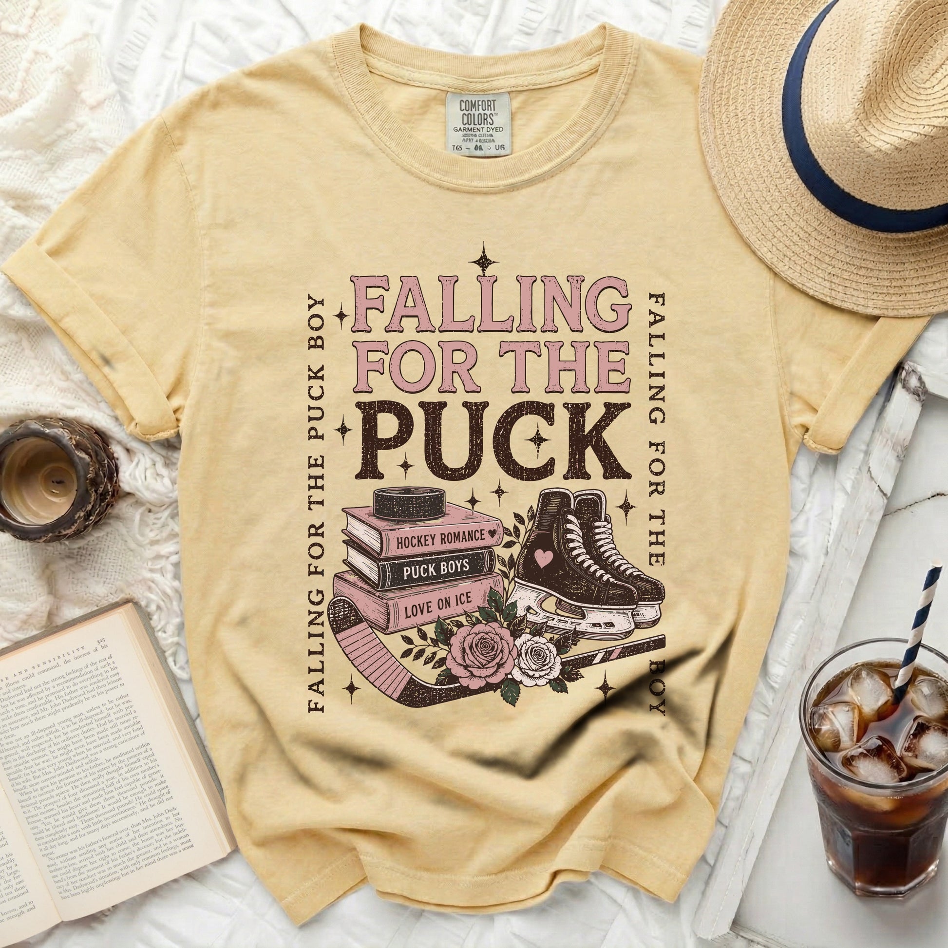 Yellow t-shirt with "Falling for the Puck Boy" text and hockey imagery.
