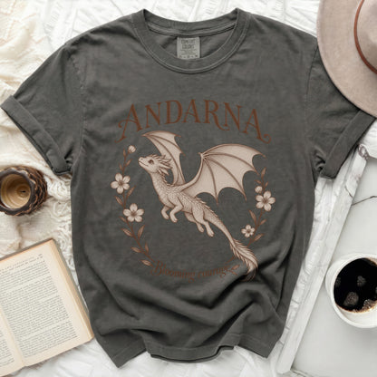 Dark gray t-shirt with a dragon, flowers, and text "ANDARNA Blooming courage."