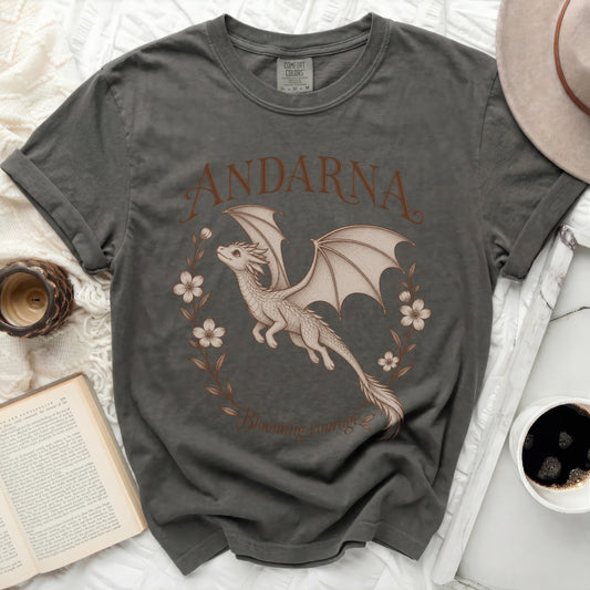 Dark gray t-shirt with a dragon, flowers, and text "ANDARNA Blooming courage."