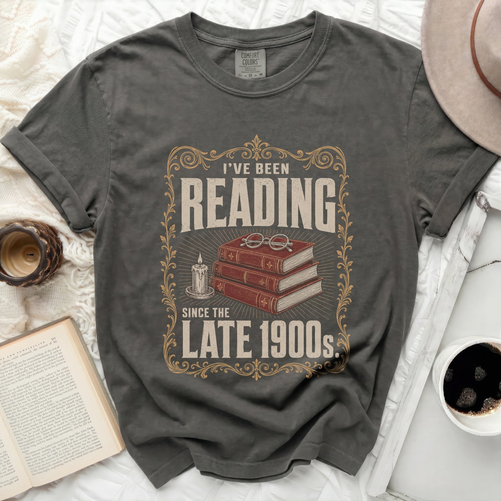 Dark grey t-shirt with "I've Been Reading Since The Late 1900s" graphic.