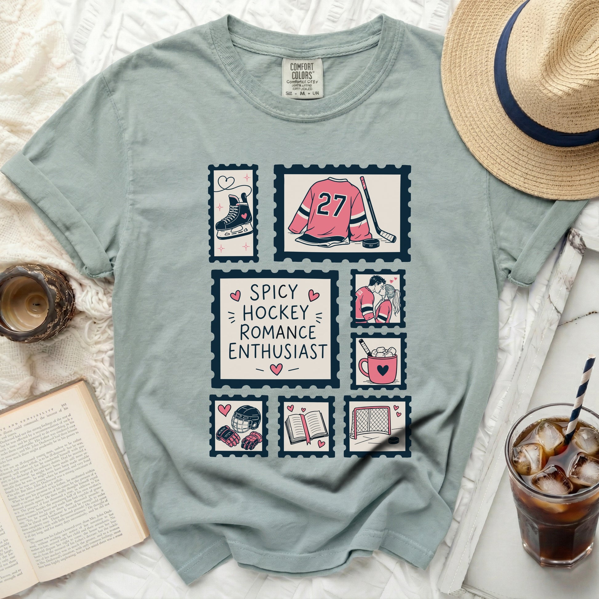 T-shirt with postage stamps featuring hockey pucks, skates, and text.