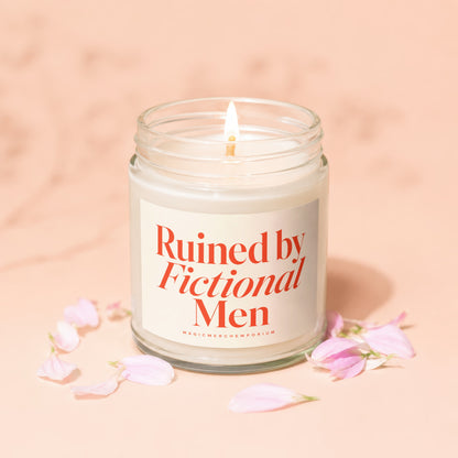 Jar candle with lit wick, featuring text "Ruined by Fictional Men".