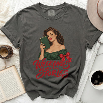 Dark grey t-shirt with a vintage illustration and red text "Weekends Are For Stories".