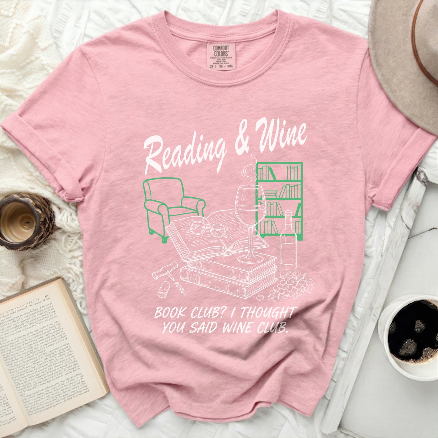 Pink t-shirt with "Reading & Wine" and "Book Club? I thought you said wine club." graphic.