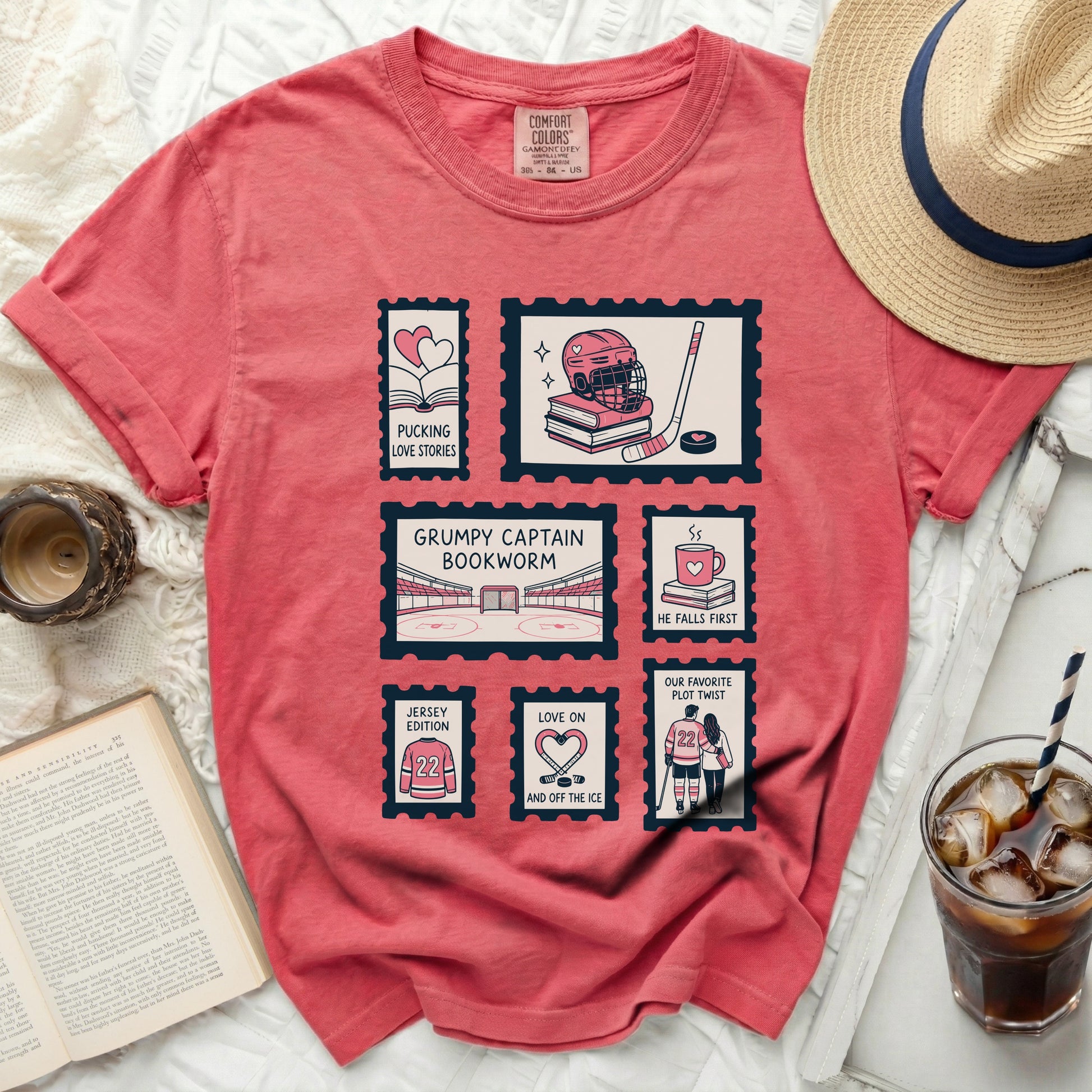 T-shirt with postage stamp designs: hockey, books, and couples.