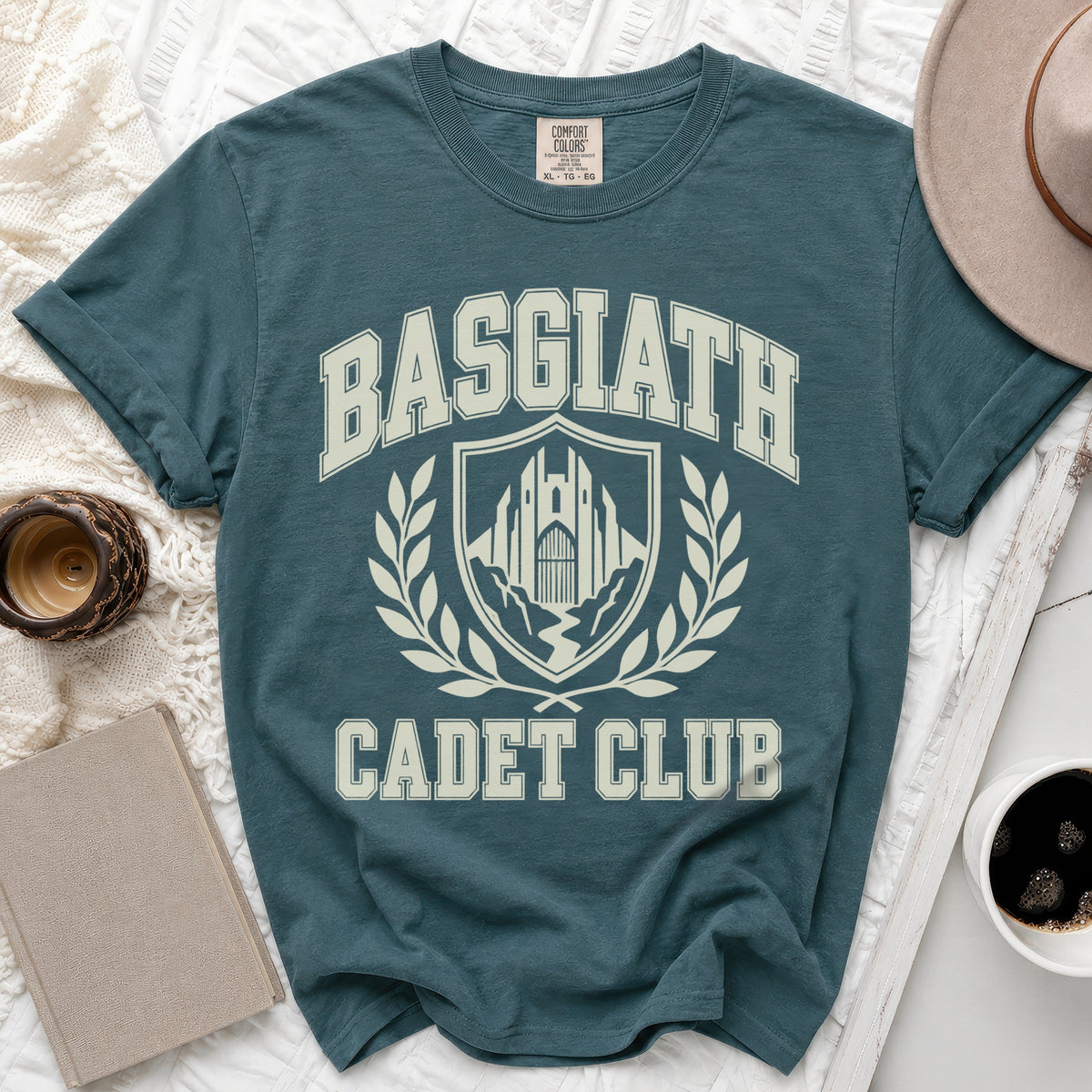 Teal t-shirt with "BASGIATH CADET CLUB" text and crest.
