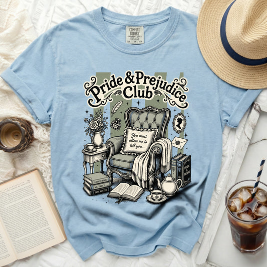 Light blue t-shirt with "Pride & Prejudice Club" design.