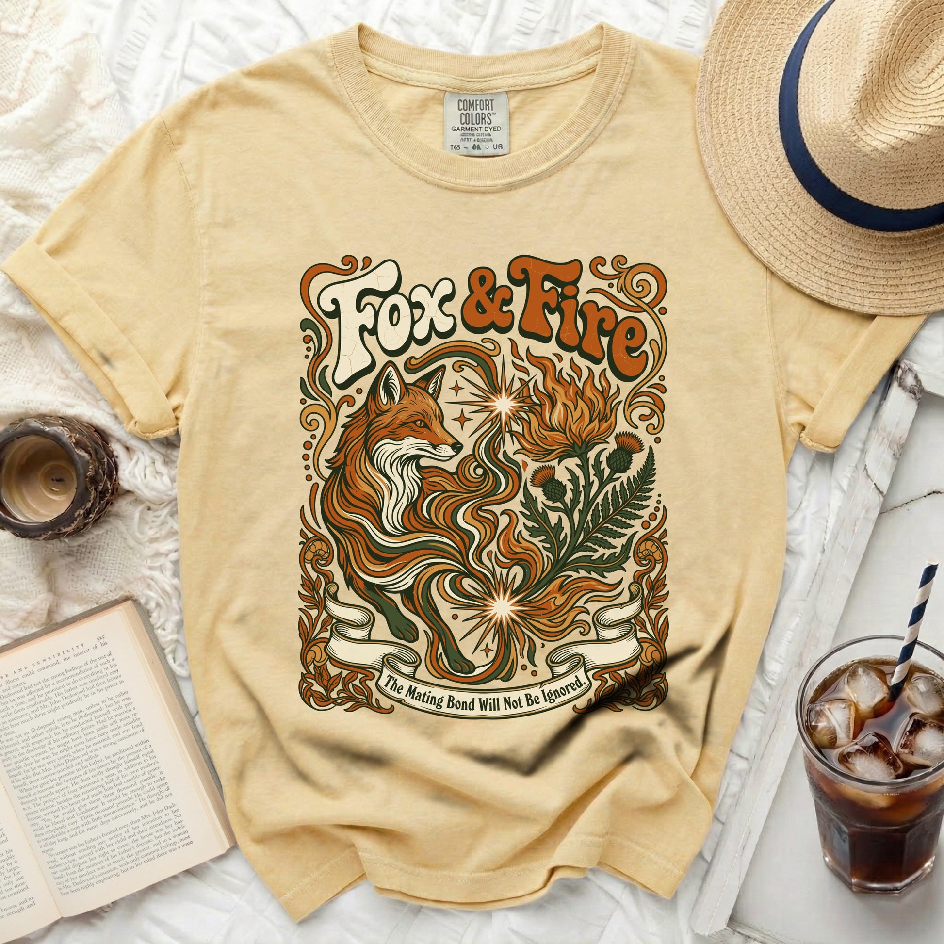 Yellow t-shirt with "Fox & Fire" text and a fox design.