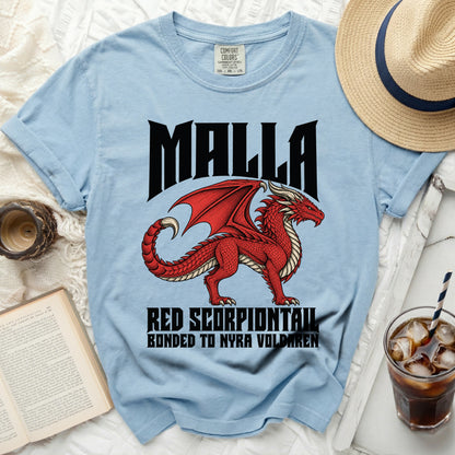 Light blue t-shirt with a red dragon and text "MALLA RED SCORPIONTAIL BONDED TO NYRA VOLDAREN".