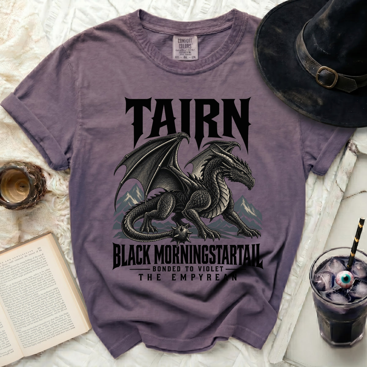 Purple t-shirt with black dragon design, text "TAIRN" and "BLACK MORNINGSTARTAIL".