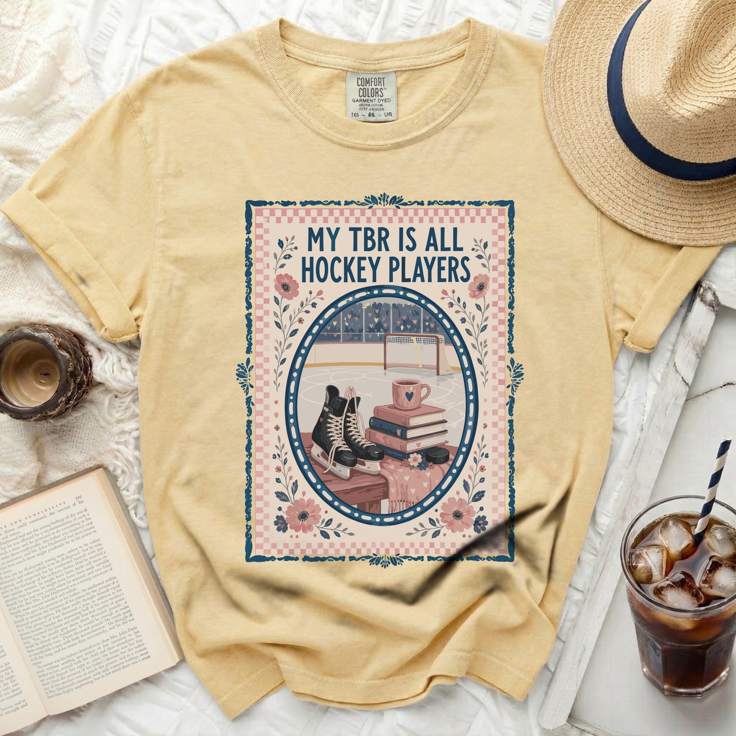 Yellow t-shirt with "My TBR is all Hockey Players" text and hockey rink graphic.
