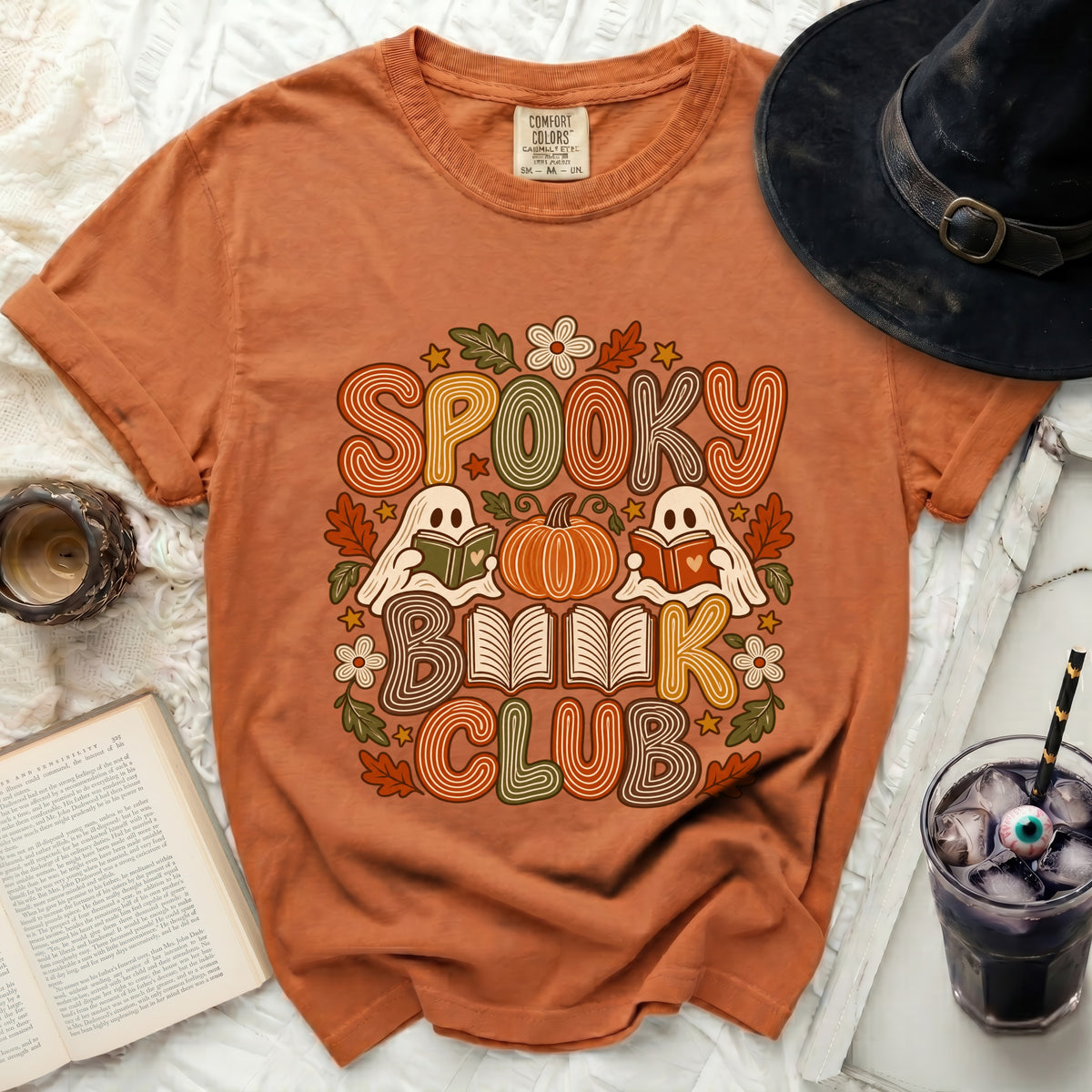 Orange shirt with "Spooky Book Club" text, ghosts, pumpkin, and fall leaves.