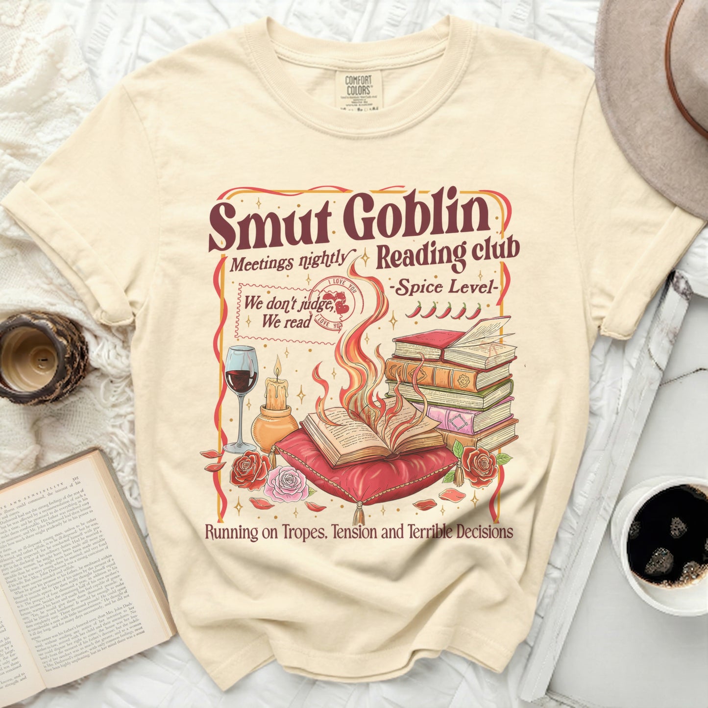 Cream t-shirt with "Smut Goblin Reading Club" text and book pile.