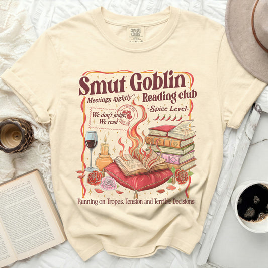 Cream t-shirt with "Smut Goblin Reading Club" text and book pile.