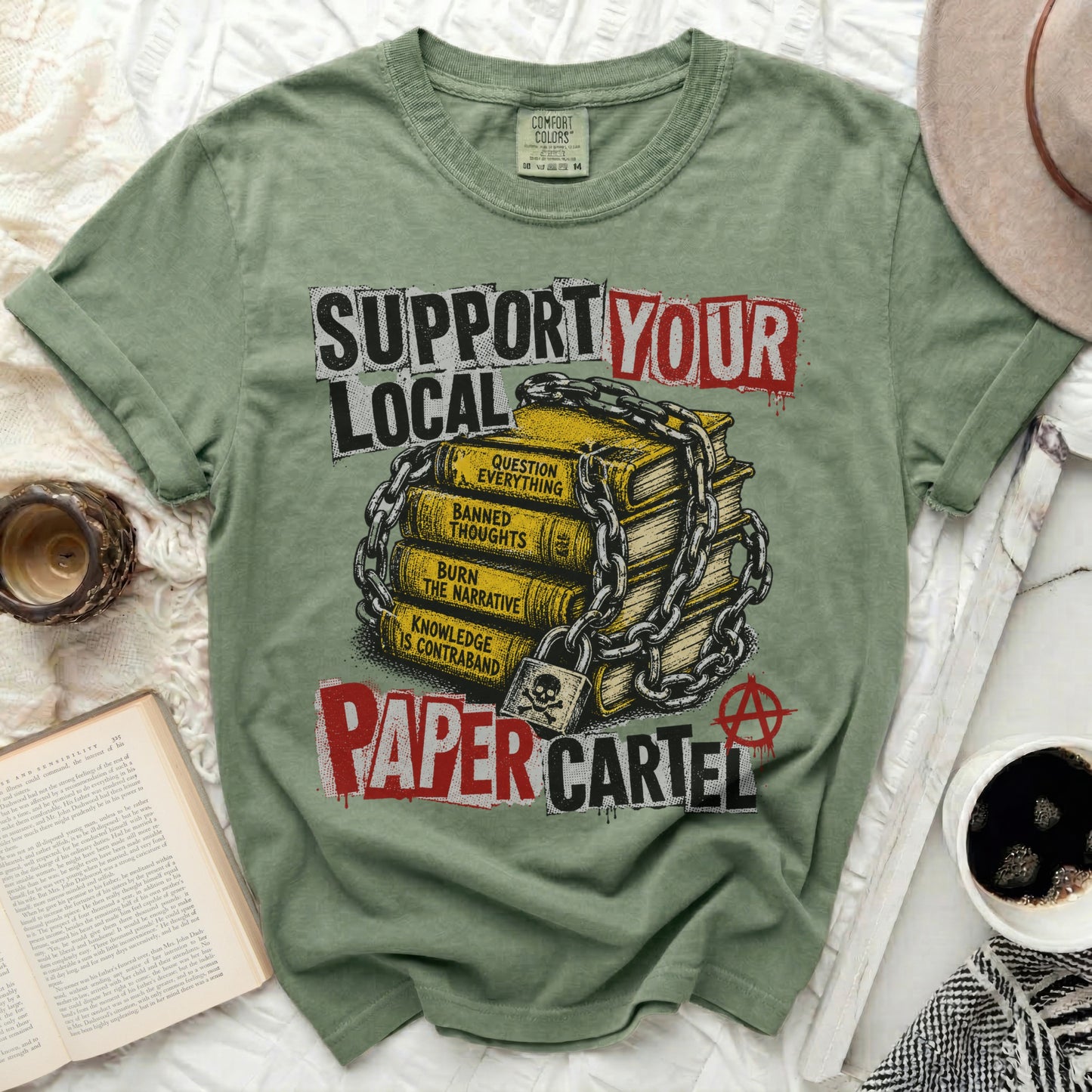 Green t-shirt with "Support Your Local Paper Cartel" text and chained books.