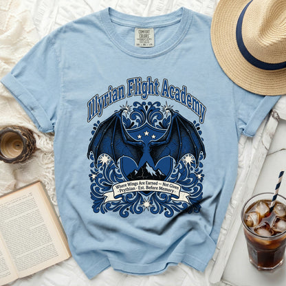 Light blue t-shirt with "Myrian Flight Academy" and winged crest.