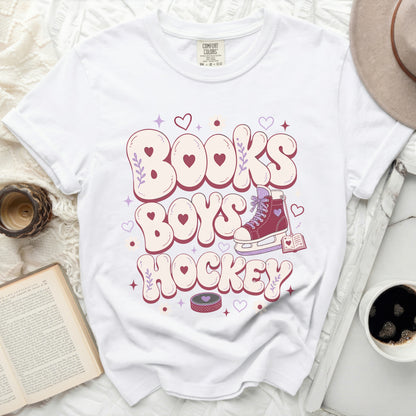 White t-shirt with "Books Boys Hockey" text and a roller skate graphic.