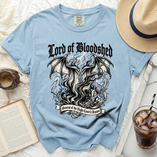 Light blue t-shirt with "Lord of Bloodshed" and bat wings graphic.
