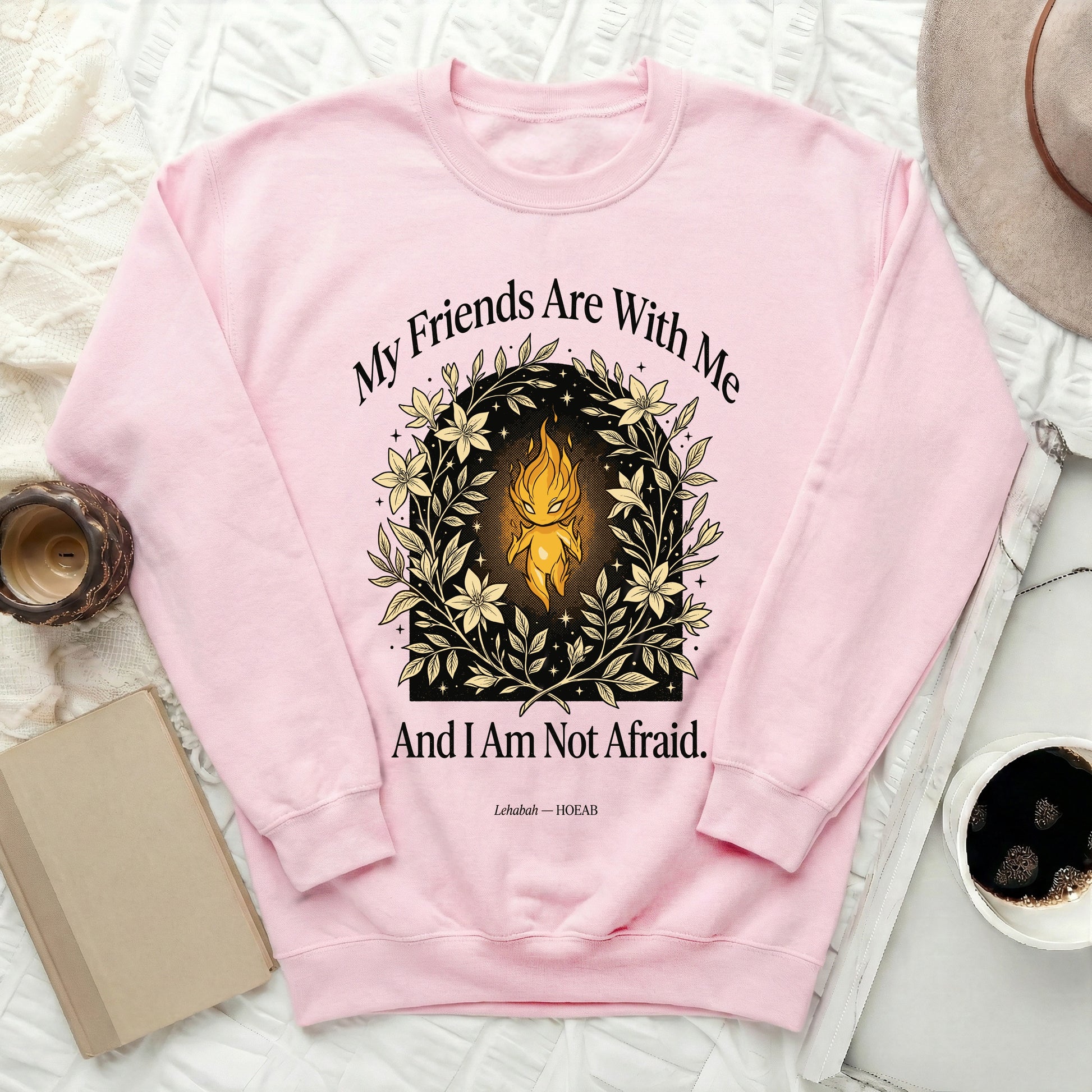 Pink sweatshirt with "My Friends Are With Me And I Am Not Afraid." quote and floral design.