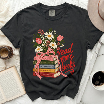 Dark t-shirt with floral bouquet over stacked books reading "Read More Books".