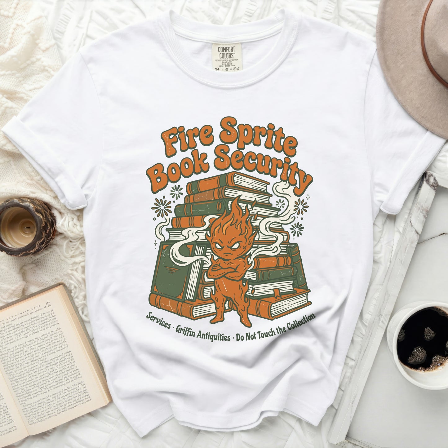 White t-shirt with "Fire Sprite Book Security" graphic.