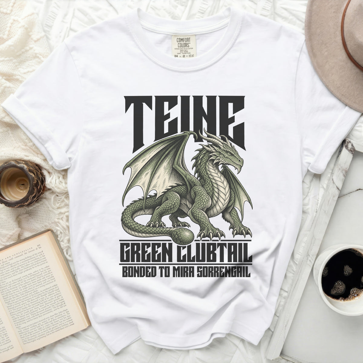 White t-shirt with "TEINE GREEN CLUBTAIL BONDED TO MIRA SORRENGAIL" text and green dragon design.