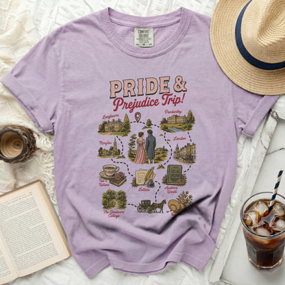 Purple t-shirt with a "Pride & Prejudice Trip!" map graphic featuring locations and illustrations.