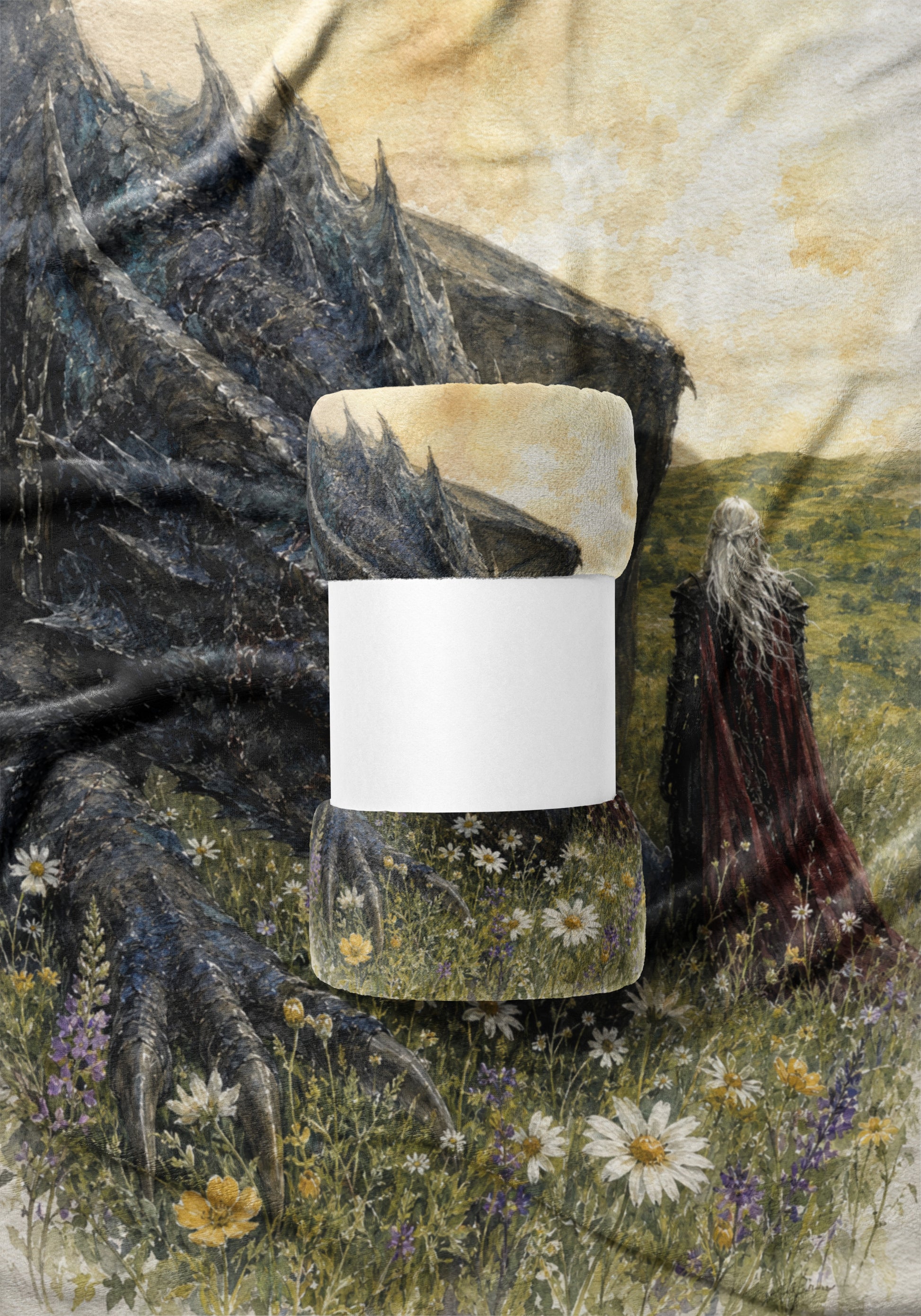 Blanket featuring dragon, cloaked figure, and meadow scene with mock label.