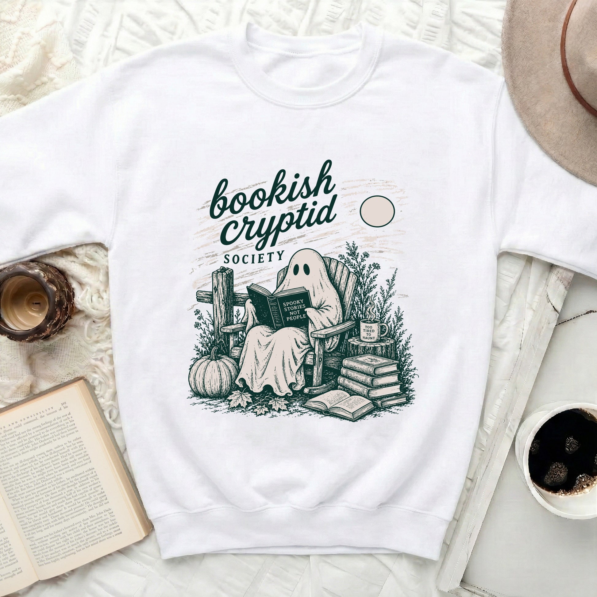 White sweatshirt with a graphic of a ghost reading "Spooky Stories Not People".