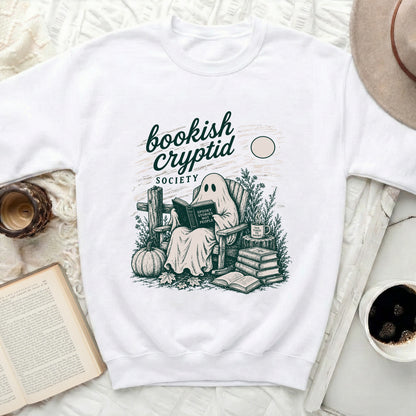 White sweatshirt with a graphic of a ghost reading "Spooky Stories Not People".