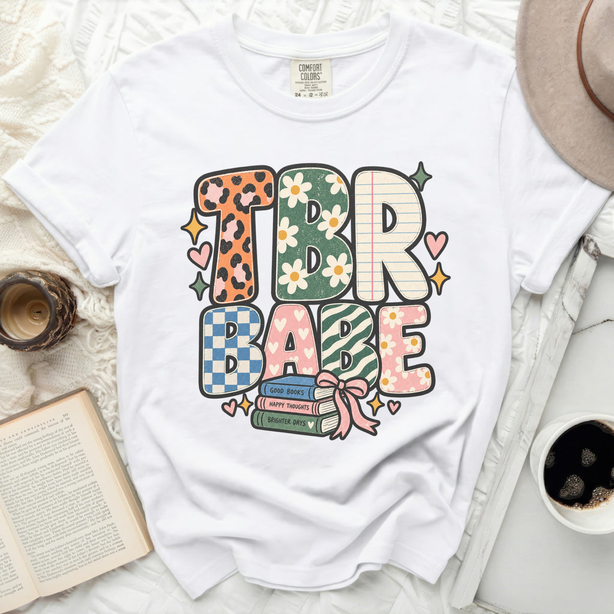 TBR Babe graphic t-shirt with books and hearts on white shirt