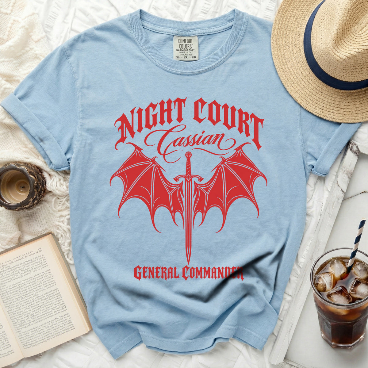 Light blue t-shirt with red "Night Court Cassian General Commander" graphic.
