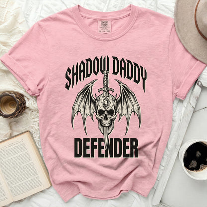 Pink t-shirt with "SHADOW DADDY DEFENDER" and skull graphic.