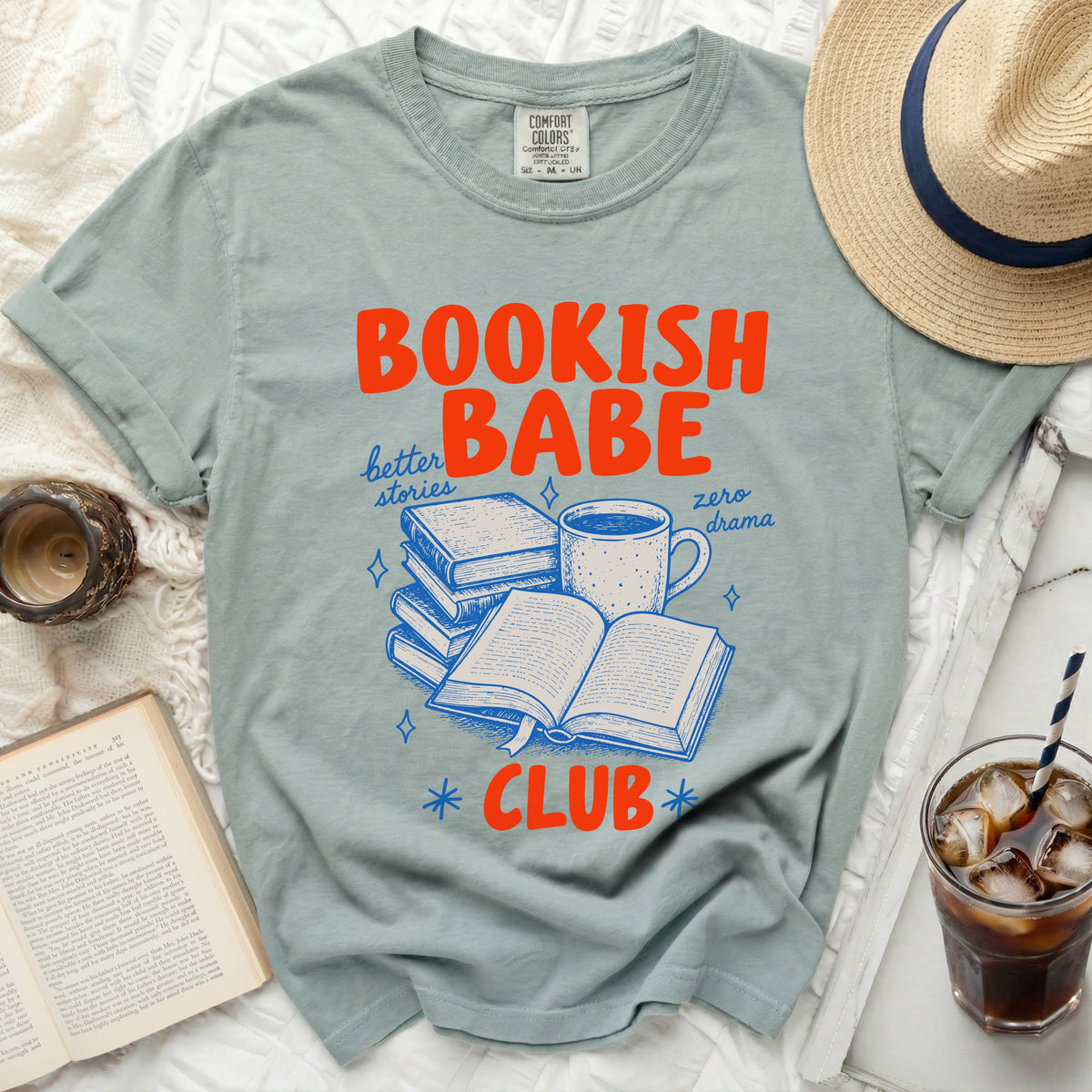 Bookish Babe Club t-shirt with graphic of books, mug, and text.